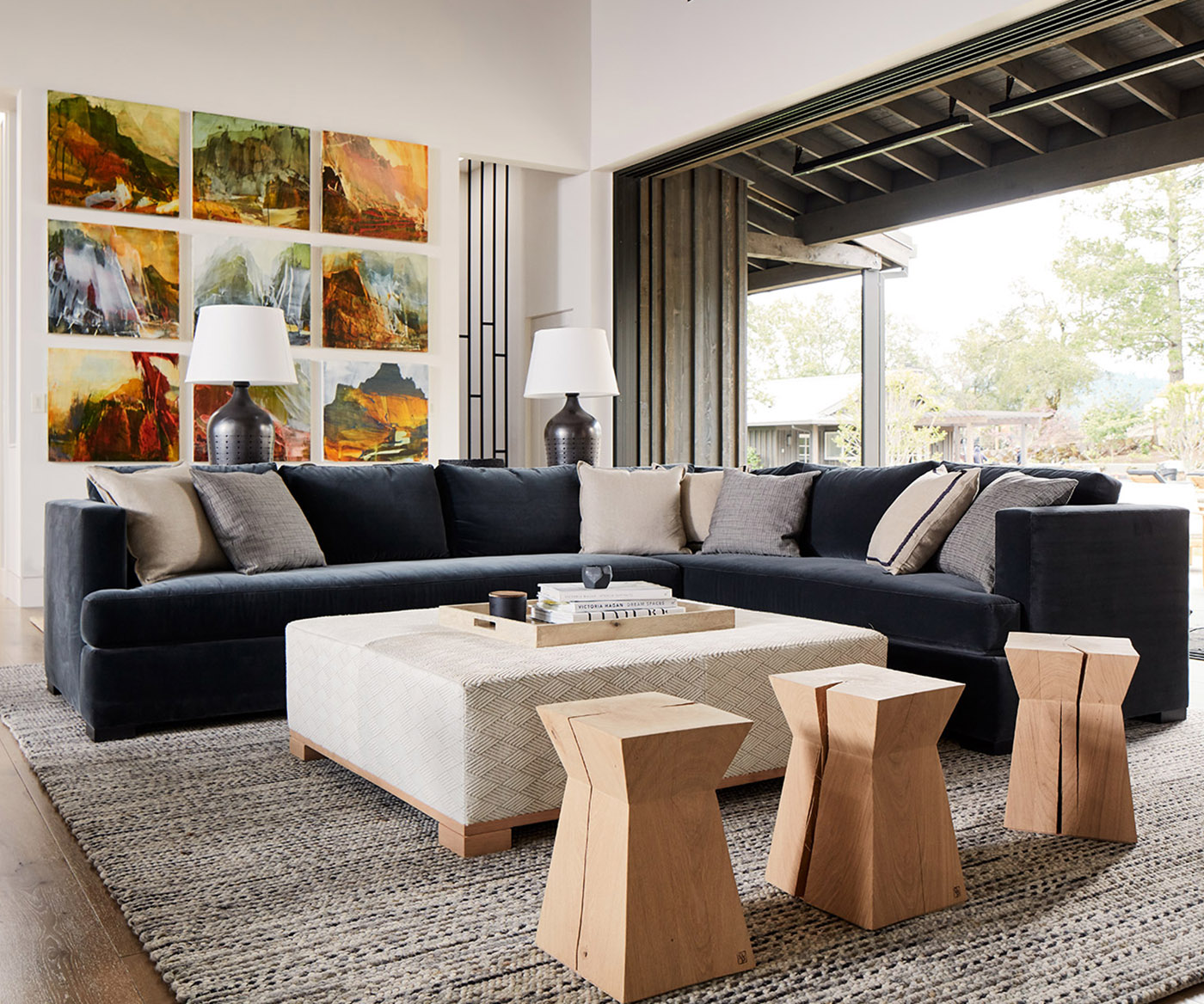 Calistoga navy sectional and patterned upholstered ottoman